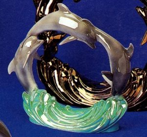 G1077 Dolphin Ring 10.5"T Bisque $19.11