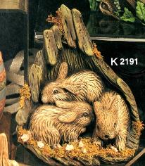 K2191 Rabbits In Log